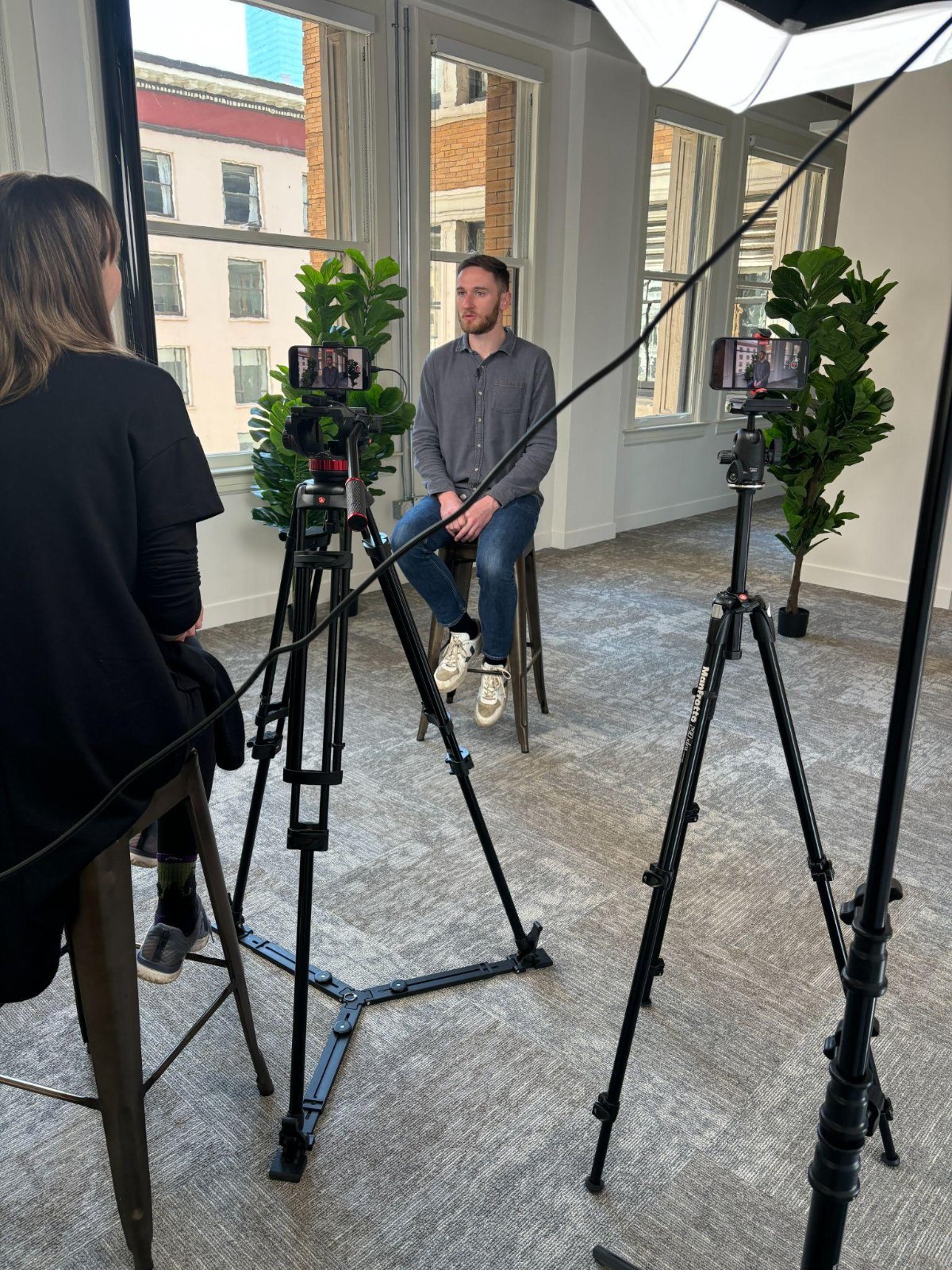Interviewing a customer on camera at Sigma
